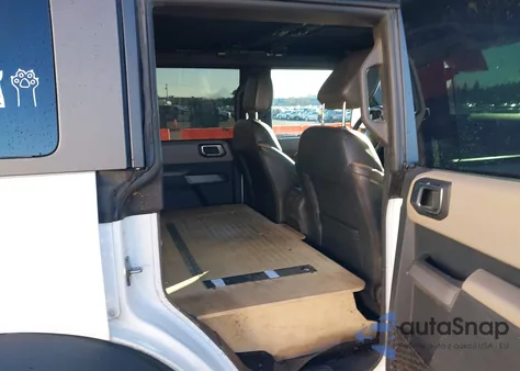 2022 Ford Bronco Wildtrak from USA, damaged, VIN 1FMEE5DP7NLB85984